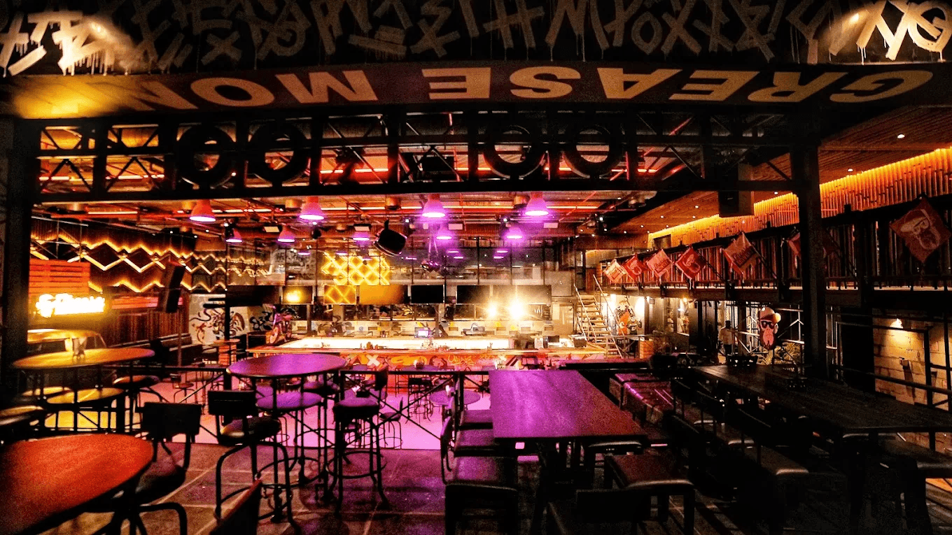 Grease Monkey neon-lit main floor